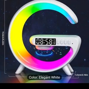 Colorful Bluetooth speaker with phone charging pad and clock.